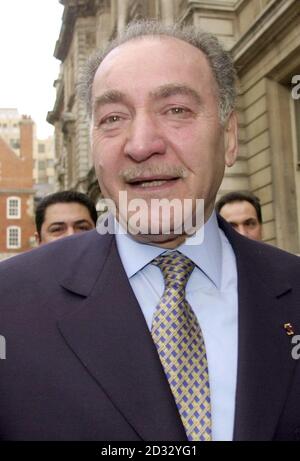 Iraqi-born business tycoon and billionaire Nadhmi Auchi leaves Bow Street Magistrates Court in central London where he is facing possible extradition charges.   * Mr Auchi, a British citizen, is wanted by the French authorities in connection with the biggest fraud trial in French history relating to the takeover of a Spanish oil refinery, Ertoil, and its subsequent sale to Elf in 1990. The tycoon also has strong links to the Labour Party.   16/05/03 : Iraqi-born business tycoon and billionaire Nadhmi Auchi.  A UK-based Iraqi billionaire facing multi-million pound fraud charges has had his arre Stock Photo