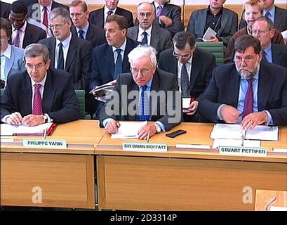 Sir Brian Moffat (centre), chairman of steel manufacturer Corus, alongside Chief Executive Philip Varin (left) and Chief Operating Officer Stuart Pettifor, giving evidence to the House of Commons Select Committee on Trade and Industry. Stock Photo