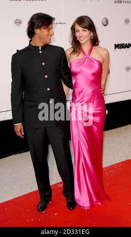 Actress Liz Hurley and boyfriend Arun Nayar arriving at the Le Moulin de Mougins restaurant, Cannes, France, for the amfAR (American Foundation for AIDS Research) 'Cinema Against AIDS Cannes 2003' event.    Stock Photo