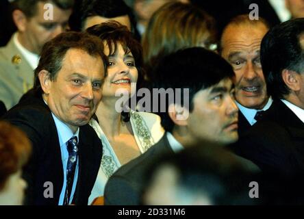 British Prime Minister Tony Blair and his wife Cherie sit with French President Jacques Chirac when they visited the theatre in St Petersburg, where they met with other world leaders for the tercentenary of the Russian city. Stock Photo