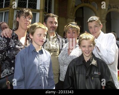 The family of the late comedian Spike Milligan (L-R) Jane Milligan (daughter), Brodie Harrower (grandson), Sean Milligan (son), Sile Harrower (daughter), Callum Harrower (grandson) and grandson Hastie Harrower at 9 Orme Close in London.  *   after Eric Sykes unveiled the Comic Heritage Blue Plaque at the former home of Milligan.  Stock Photo