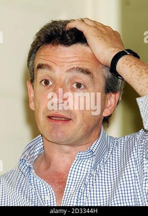 Ryanair's chief executive Michael O'Leary at a press conference in central London, where he announced that first quarter net profits for the company climbed 12% to a record 43.8 million euros - 30.8 million. The Irish no-frills carrier flew 5.1 million passengers in the three months to June 30 - up 45% on the same period last year. It was boosted by new routes and the takeover of rival Buzz earlier this year. The results came a day after monthly passenger figures for July showed that the Dublin-based airline had broken through the two million mark - a first for any non US low cost airline. Stock Photo