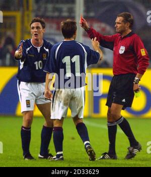 Scotland's number 10 Maurice Ross is shown a red card by referee Anders Frisk during their group five Euro 2004 qualifier against Germany at Westfalen Stadium, Dortmund, Germany. Scotland lost the match 2-1, leaving them in third place in the group with one round of matches to play. Stock Photo