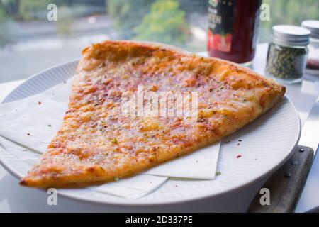 Food photography flat lay of new york slice pizza Stock Photo