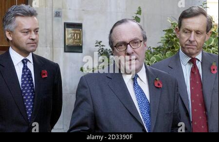 Deputy Chairman Michael Ancram (centre) stands with Alan Duncan (left) and Richard Spring outside the Conservative Party offices in London where he became the latest Tory heavyweight to step aside in favour of Michael Howard in the party leadership contest. Mr Ancram confirmed that as long as Mr Howard remained the sole candidate he would not put his own name forward for election. Stock Photo