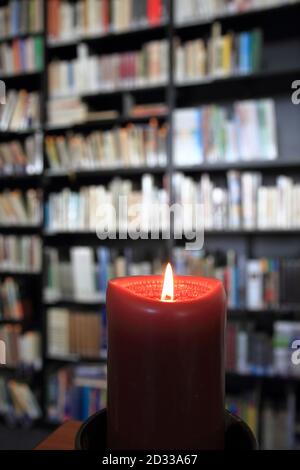small library with candle as inteklectual background Stock Photo