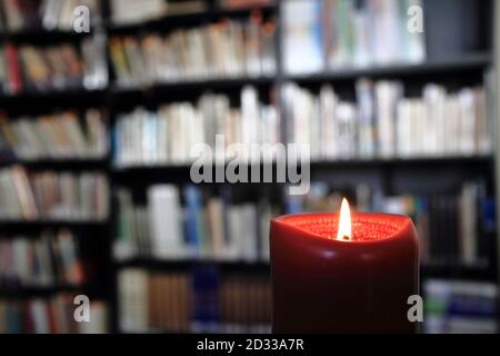 small library with candle as inteklectual background Stock Photo