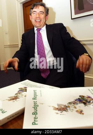 Chancellor of the Exchequer Gordon Brown in his office in the  Treasury.  Mr Brown, in his Pre-Budget Report, will offer help to local councils to stimulate enterprise, and to families with children, saying employers should take more responsibility for child care. Stock Photo