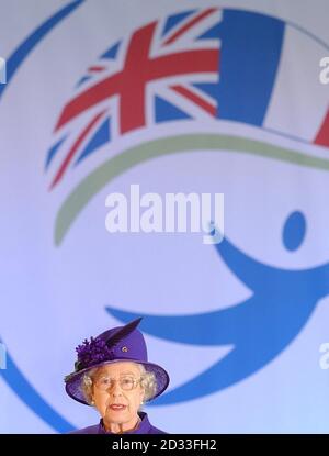 Britain's Queen Elizabeth II gives a speech during the official inauguration of the Virgin airbus named 'Queen of the Skies', in Toulouse during her official state visit to France. Stock Photo