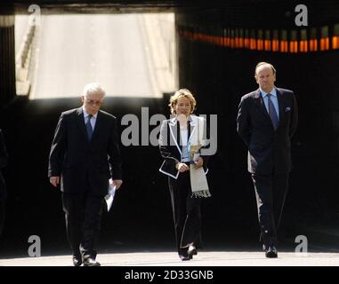 (from left-right) Royal Corroner Michael Burgess with French police chief Madame Martine Monteil and Metropolitan Police Commissioner Sir John Stevens walking through the road tunnel near Pont de l'Alma, in which Diana, the Princess of Wales, and Dodi Fayed died in a car crash seven years ago. Sir John said so far he had only been looking at general information such as videos and photographs. Stock Photo