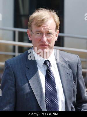 Anaesthetist Robert Falconer, 45, arrives at Swansea Crown Court, where he denies manslaughter after the death of a baby during an operation at Singleton Hospital in Swansea in April 2002. The consultant mistakenly injected air directly into the bloodstream of Aaron Havard, instead of into a tube linked to the six-week-old's nose during an operation to rectify a thickening of the stomach wall from which the baby was suffering.  Stock Photo