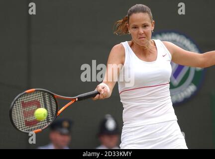 Lindsay Davenport from the USA in action against Karolina Sprem from Croatia in the fourth round of the Ladies Single tournament of The Lawn Tennis Championships at Wimbledon, London. Sprem knocked out three seeds before this match but lost in straight sets to the former champion 6:2/6:2.  EDITORIAL USE ONLY, NO MOBILE PHONE USE. Stock Photo