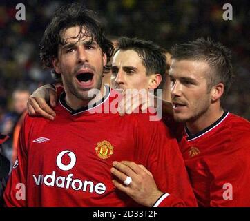 Manchester United's Ruud Van Nistelrooy celebrates his last minute equaliser with David Beckham & Gary Neville, during UEFA Champions League game at Stade de La Beaujoire in Nantes. THIS PICTURE CAN ONLY BE USED WITHIN THE CONTEXT OF AN EDITORIAL FEATURE. NO WEBSITE/INTERNET USE UNLESS SITE IS REGISTERED WITH FOOTBALL ASSOCIATION PREMIER LEAGUE. Stock Photo