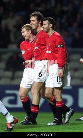 Manchester United's Laurent Blanc (centre) celebrates 1st goal against Boavista, with Paul Scholes (left) and captain Ryan Giggs, during Champions League game at the Estadio Do Bessa in Oporto. Stock Photo