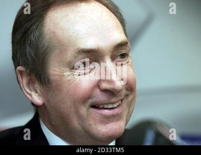 Liverpool manager Gerard Houllier smiles during a press conference at Anfield, Liverpool. Houllier in his first press conference since returning from heart surgery, ahead of his sides UEFA Champion's League quarter final first leg match against Bayer Leverkusen at Anfield tommorrow.  THIS PICTURE CAN ONLY BE USED WITHIN THE CONTEXT OF AN EDITORIAL FEATURE. NO WEBSITE/INTERNET USE UNLESS SITE IS REGISTERED WITH FOOTBALL ASSOCIATION PREMIER LEAGUE. Stock Photo