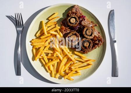 Steak mushrooms and chips Stock Photo