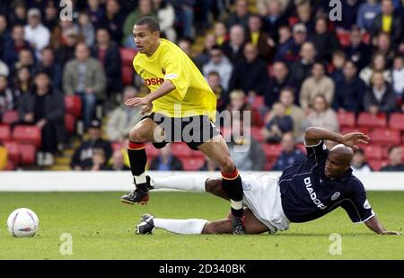 Watford's Danny Webber gets away from Sheffield Wednesday's Danny Maddix (right) during the Nationwide Division One match at Vicarage Road, Watford. Watford defeated Sheffield Wednesday 1-0. Stock Photo