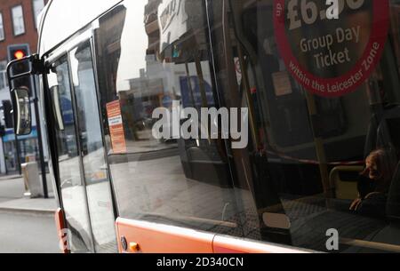 Leicester, Leicestershire, UK. 7th October 2020. A woman travels on a bus 100 days since the UKÕs first local coronavirus pandemic lockdown was announced in the city. Credit Darren Staples/Alamy Live News. Stock Photo
