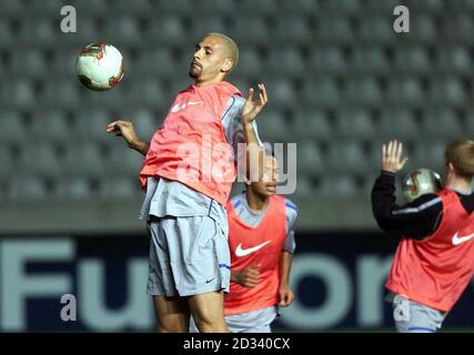 Manchester United's Rio Ferdinand in action during a training session at G.S.P. Stadium, Nicosia, Cyprus ahead of the Champions League match against Maccabi Haifa.  THIS PICTURE CAN ONLY BE USED WITHIN THE CONTEXT OF AN EDITORIAL FEATURE. NO WEBSITE/INTERNET USE UNLESS SITE IS REGISTERED WITH FOOTBALL ASSOCIATION PREMIER LEAGUE. Stock Photo