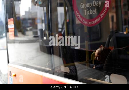 Leicester, Leicestershire, UK. 7th October 2020. A woman travels on a bus 100 days since the UKÕs first local coronavirus pandemic lockdown was announced in the city. Credit Darren Staples/Alamy Live News. Stock Photo