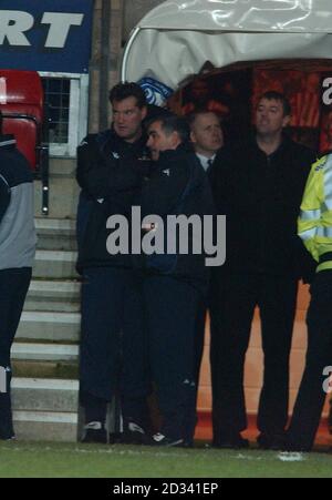 Southampton versus Tottenham Hotspurs manager Glenn Hoddle (left) and assistant John Gorman, with former Southampton player Matt Le tissier in background (right),  during their FA Cup Third Round match at Southampton's St Mary's Stadium.  THIS PICTURE CAN ONLY BE USED WITHIN THE CONTEXT OF AN EDITORIAL FEATURE. NO WEBSITE/INTERNET USE UNLESS SITE IS REGISTERED WITH FOOTBALL ASSOCIATION PREMIER LEAGUE.  Stock Photo