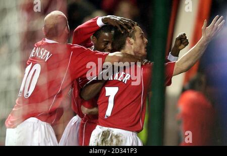 Charlton Athletic's Scott Parker (No.7) celebrates his first half goal against visitors West Ham United, during their Barclaycard Premiership match at The Valley, London. THIS PICTURE CAN ONLY BE USED WITHIN THE CONTEXT OF AN EDITORIAL FEATURE. NO WEBSITE/INTERNET USE UNLESS SITE IS REGISTERED WITH FOOTBALL ASSOCIATION PREMIER LEAGUE. Stock Photo