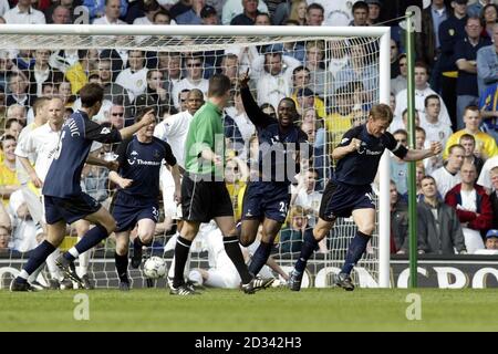 Tottenham Hotspurs' Teddy Sheringham (R) cekebrates his goal against Leeds United during their FA Barclaycard Premiership match at Leeds' Elland Road ground. Stock Photo