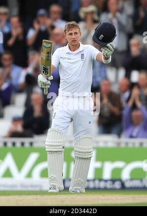 England's Joe Root reaches his century against India during the Fifth Test at The Kia Oval, London. Stock Photo