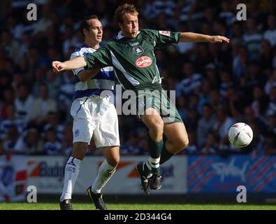 Queens Park Ranger's Matthew Rose (left) in action against Plymouth Argyle's Micky Evans during their Coca Cola Championship match at Loftus Road, London, Saturday, September 11, 2004.  THIS PICTURE CAN ONLY BE USED WITHIN THE CONTEXT OF AN EDITORIAL FEATURE. NO UNOFFICIAL CLUB WEBSITE USE. Stock Photo