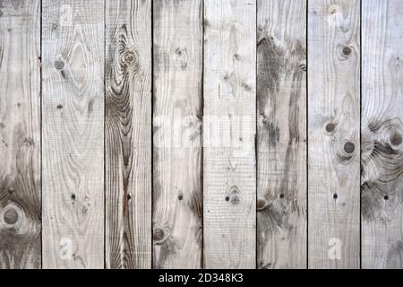 Background of vertical wooden boards. Wooden surface after rain. Wet boards. Stock Photo