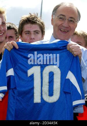 Conservative leader Michael Howard is presented with a football shirt bearing the appropriate number 10. Stock Photo