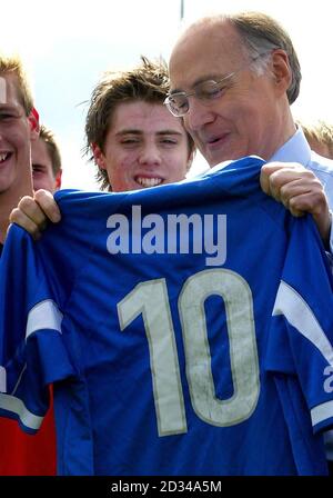 Conservative leader Michael Howard is presented with a football shirt bearing the appropriate number 10. Stock Photo