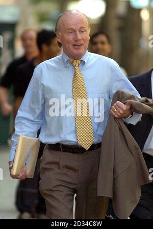 David Davies, the Football Association's executive director arrives at an employment tribunal in London, Thursday June 23, 2005 where he will give evidence after being accused of sexually harassing Faria Alam, his personal assistant. Stock Photo