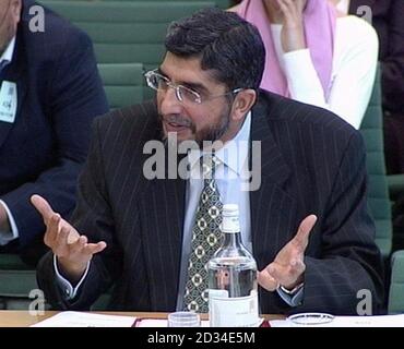 Sir Iqbal Sacranie, General Secretary of the Muslim Council of Britain speaks before the all-party Home Affairs Select Committee in the House of Commons, London, Tuesday September 13, 2005. Home Secretary Charles Clarke faced questioning by MPs over their response to the London bombings. See PA story POLITICS Terror. PRESS ASSOCIATION Photo. Photo credit should read: PA Stock Photo