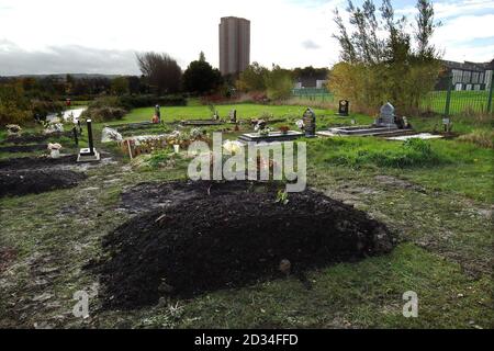 A quiet corner of Cottingley Cemetery close to Leeds city centre, Thursday November 3, 2005 with the freshly excavated grave (foreground) of London suicide bomber Hasib Hussain who was buried last night. He died when the device he carried exploded on a London bus. PRESS ASSOCIATION Photo. Photo credit should read: John Giles/PA Stock Photo