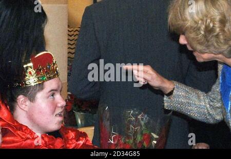 Duchess of Cornwall talks to Paul Parker, 15, from Cardiff and during the visit of a group from Ty Hafan Children's Hospice in Cardiff at Highgrove House, Tetbury, Gloucestershire, Monday December 19, 2005. Ten excited youngsters were invited to the Prince's Highgrove estate in Gloucestershire to help the Royal couple decorate their Christmas tree. Charles and Camilla spent nearly an hour chatting and joking with the children, who were all being cared for at the Ty Hafan children's hospice in Barry, South Wales. See PA Story ROYAL Tree. PRESS ASSOCIATION Photo. Photo credit should read: Barry  Stock Photo