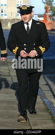 Royal Navy Lieutenant James Carrick leaves a court martial at HMS Nelson in Portsmouth, Wednesday January 11, 2005 where he was a witness and one of five alleged victims of bullying by former commanding officer Captain Robert Tarrant. See PA story COURTS Submarine. PRESS ASSOCIATION Photo. Photo credit should read: Chris Ison/PA Stock Photo