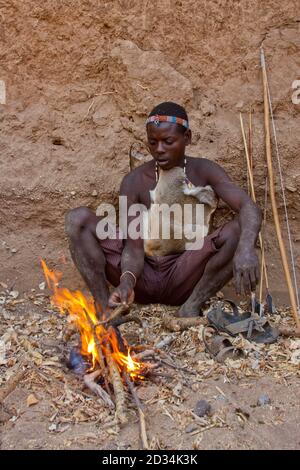 Portrait of a Hadza hunter. The Hadza, or Hadzabe, are an ethnic group in north-central tanzania, living around Lake Eyasi in the Central Rift Valley Stock Photo