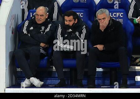 Manchester United manager Jose Mourinho (right) and coach Rui Faria (centre) during the Premier League match at the King Power Stadium, Leicester. Stock Photo