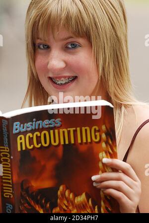 EMBARGOED TO 0001 MONDAY JUNE 19. Aspiring accountant Emma McDowall, 17, who has been named as the first recipient of a scholarship set up in memory of one of the victims of the July 7 bombings in London, reads a textbook at Lockerbie Academy. Stock Photo