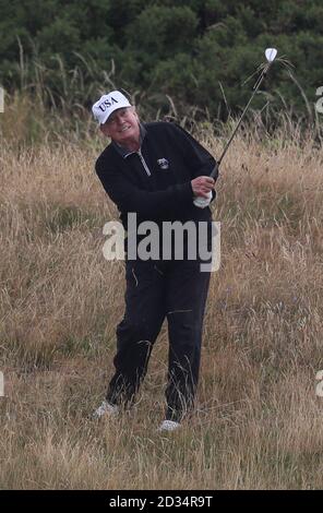 US President Donald Trump on his golf course at the Trump Turnberry resort in South Ayrshire, where he and his wife Melania, spent the weekend as part of their visit to the UK before leaving for Finland where he will meet Russian leader Vladimir Putin for talks on Monday. Stock Photo