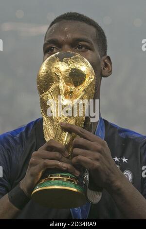 France's Paul Pogba celebrates with the trophy after winning the FIFA World Cup Final at the Luzhniki Stadium, Moscow. Stock Photo