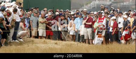 USA's Phil Mickelson plays his shot from the out of bounds area on the fourth hole during the third round of the 135th Open Championship at Royal Liverpool Golf Club, Hoylake. Stock Photo