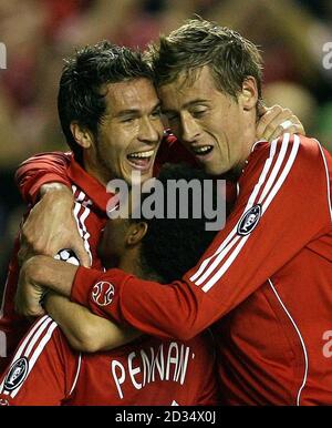 **ALTERNATE CROP 'SOCCER Liverpool 5'** Liverpool's Luis Garcia celebrates his goal against Galatasary with Peter Crouch (right) and Jermaine Pennant during the UEFA Champions League, Group C match at Anfield Stadium, Liverpool.  Stock Photo