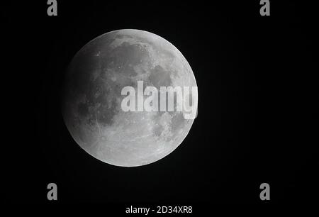 A super blood wolf moon over Liverpool during a lunar eclipse. Stock Photo