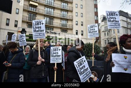Protestors outside The Dorchester hotel on Park Lane, London demonstrating against the Brunei anti-gay laws. Stock Photo
