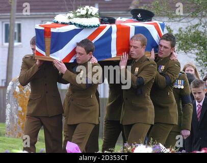 The coffin of Rifleman Daniel Coffey arrives for his funeral at St Andrew's Church in Cullompton, Devon. Stock Photo