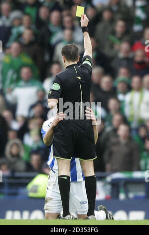 Kilmarnock player Paul Di Giacomo (hidden) is booked by referee Dougie McDonald during the CIS Insurance Cup Final at Hampden Park in Glasgow  PRESS ASSOCIATION Photo.  Picture date:  Sunday 18th March, 2007 Photo credit should read:  Andrew MilliganPA. Stock Photo