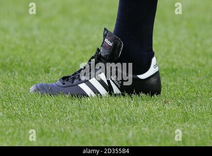 Scotland's Christian Dailly's boots, which were bought for him in Glasgow after he was called into the squad while on holiday, during a training session at the Gerhard Hanappi Stadium, Vienna, Austria. Stock Photo