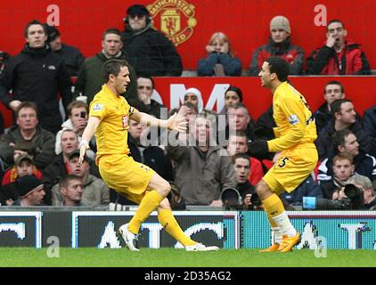 Tottenham Hotspur's Robbie Keane (left) celebrates scoring the opening goal. Stock Photo